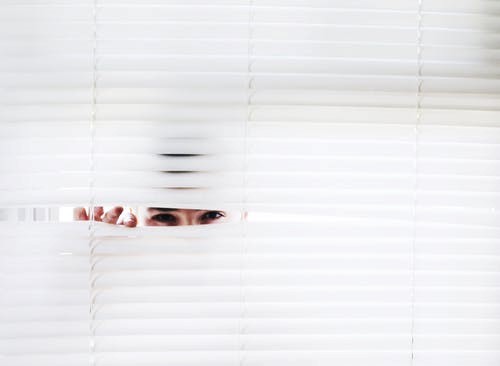 Photography of Person Peeking